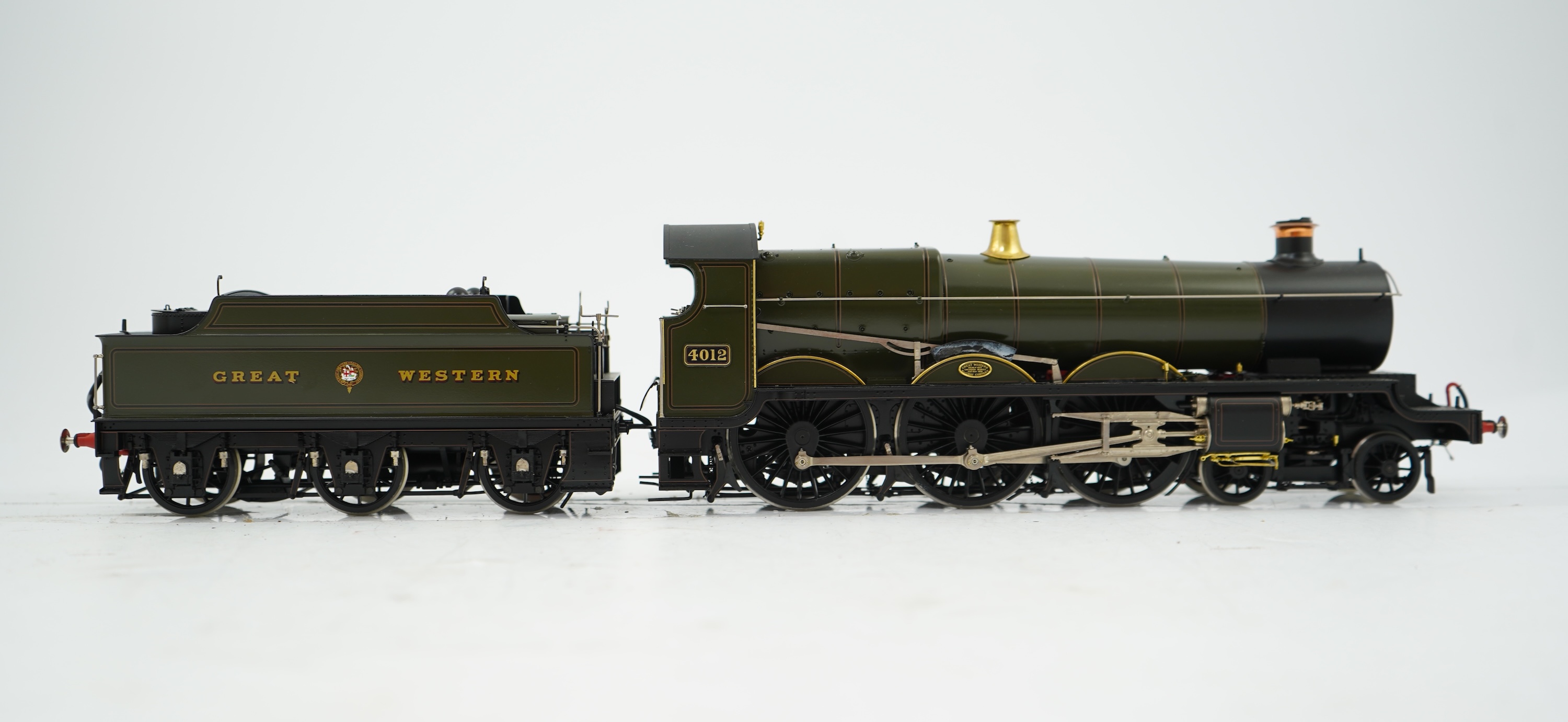 An 0 gauge Masterpiece Models model of GWR Star Class, Knight of the Thistle, 4012, 4-6-0 tender locomotive, powered for two rail operation, with original box, accessories, instruction booklet and other paperwork.